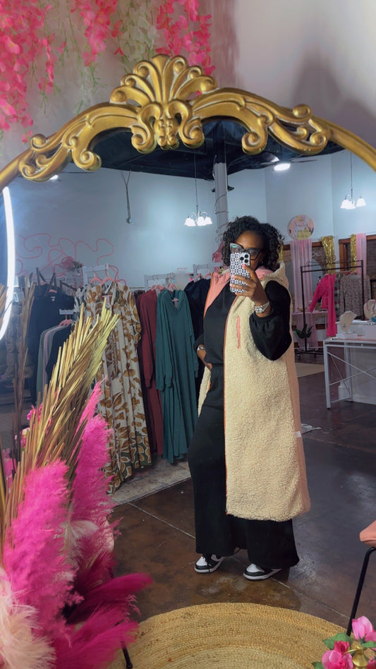 The REVERSIBLE SHERPA PUFFER VEST