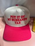 The Husband’s Tab Trucker Hat