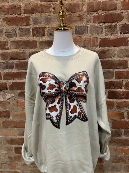 The Bling Cow Print Bow Sweatshirt
