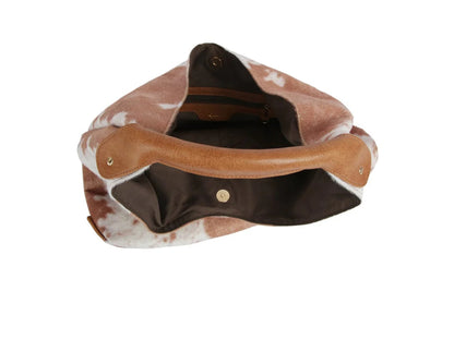 The Faux Suede Cow Print Hobo Tote Bag With Tassels