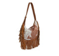 The Faux Suede Cow Print Fringe Hobo Bag